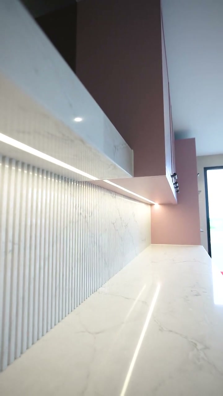 A CEK kitchen with fluted marble